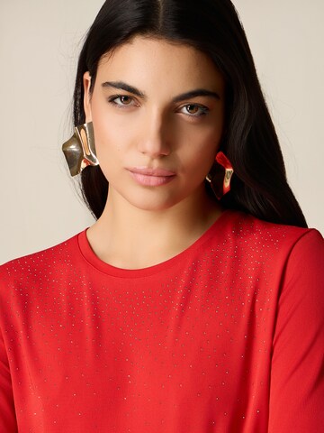 T-shirt oltre en rouge