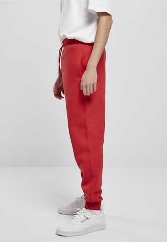 Urban Classics - Tapered Calças em vermelho