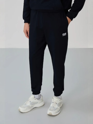 Tommy Life Sportpak in Zwart