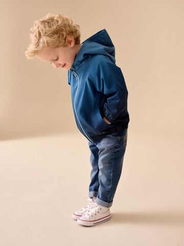 NextPrijelazna jakna - plava boja