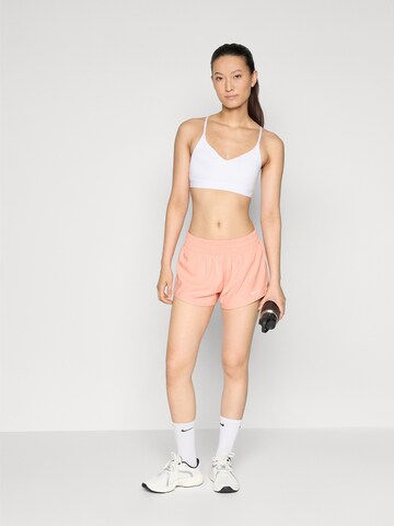 NIKE Loosefit Sportshorts 'ONE' in Orange