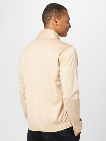 Champion Authentic Athletic Apparel Tracksuit in Beige