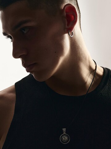 Orecchino 'BONE' di REYTEL in argento