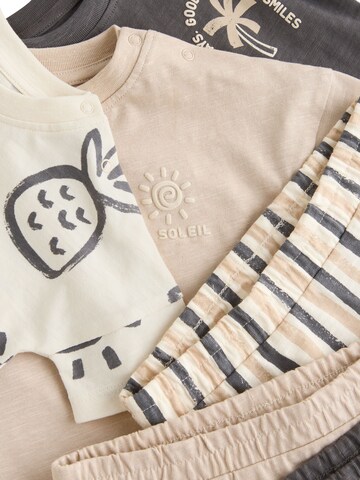 Set Next en beige