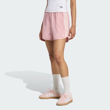 ADIDAS ORIGINALS Loose fit Trousers in Pink: front