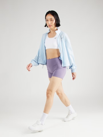 NIKE Skinny Spodnie sportowe 'ONE' w kolorze fioletowy