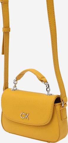 Calvin Klein Crossbody Bag in Gold: front
