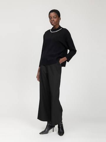 Influencer Pullover in Schwarz