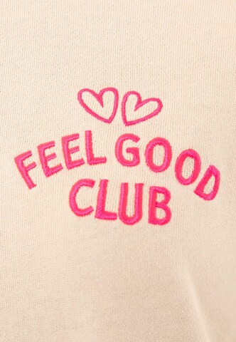 Sweat-shirt 'FEEL GOOD CLUB' Zwillingsherz en beige