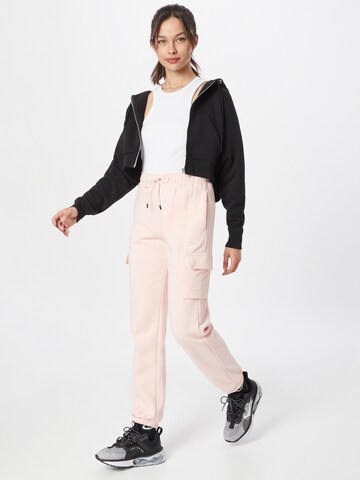 Effilé Pantalon cargo Nike Sportswear en rose
