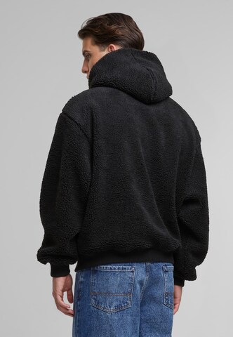 Karl Kani Sweatshirt in Black