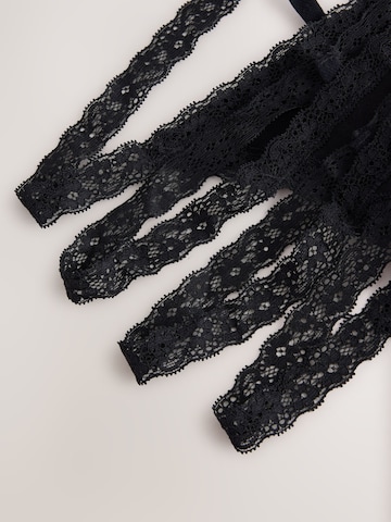 Next - Tanga en negro