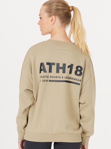 Athlecia Sports sweatshirt 'Naomi' in Beige: front