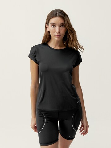 T-shirt fonctionnel 'Aina' Born Living Yoga en noir : devant