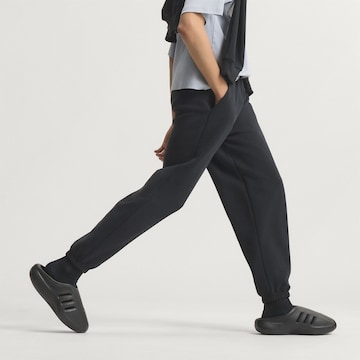ADIDAS SPORTSWEAR Ohlapna forma Športne hlače | črna barva