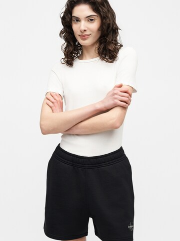 regular Pantaloni di Calvin Klein Jeans in nero