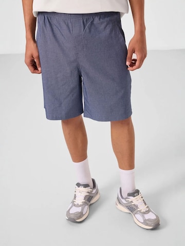 Tommy Life - Perna larga Calças chino em azul