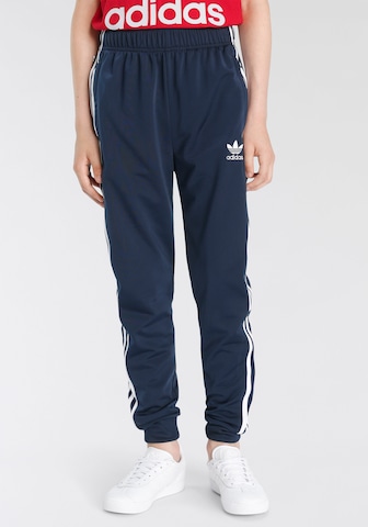 ADIDAS ORIGINALS - Tapered Pantalón 'Adicolor Sst' en azul: frente