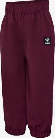 Effilé Pantalon de sport 'Jupitor' Hummel en rouge