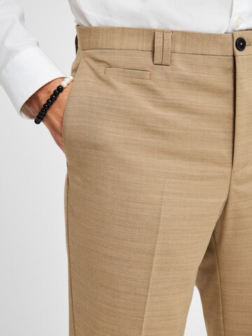 Coupe slim Pantalon à plis 'Ostfold' Viggo en marron