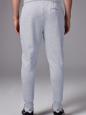 Tapered Pantaloni di Next in grigio