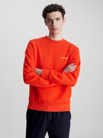 Sweat-shirt Calvin Klein en orange : devant