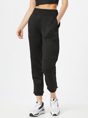 PUMA Tapered Sportbroek in Zwart: voorkant