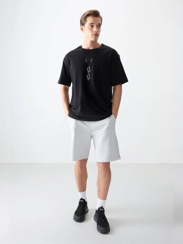 Tommy Life T-Shirts in Schwarz