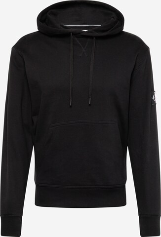 Sweat-shirt Calvin Klein Jeans en noir : devant