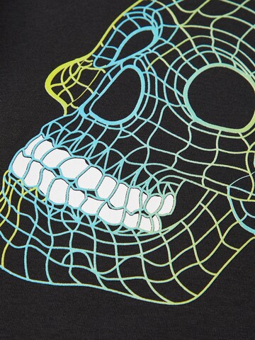 NAME IT - Camiseta 'KARDO' en negro