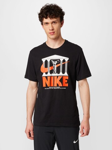 NIKE - Camisa funcionais em preto: frente