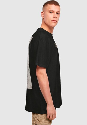 Merchcode T-Shirt 'Missing Peace' in Schwarz