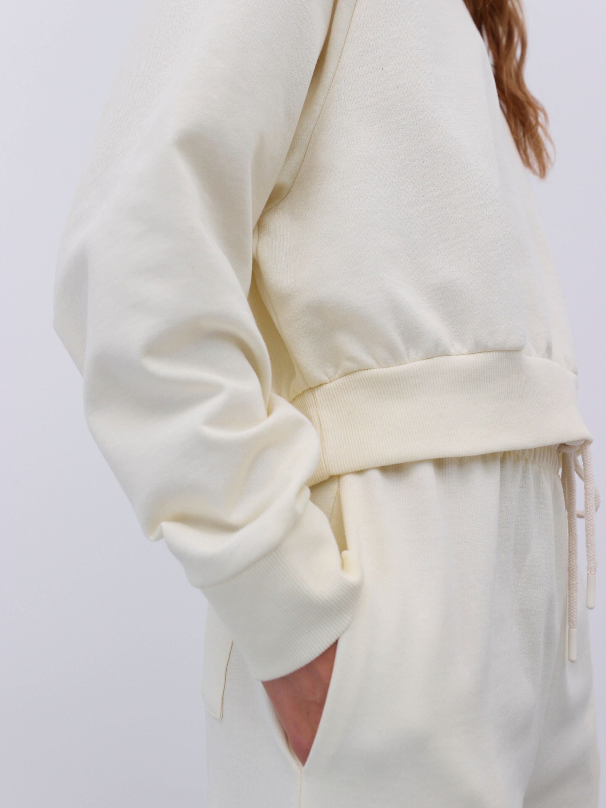 EDITED Produkte Sweatshirt 'Aura' creme