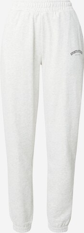 Athlecia Tapered Workout Pants in White: front