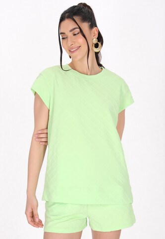 faina Athlsr - Camisa em verde: frente