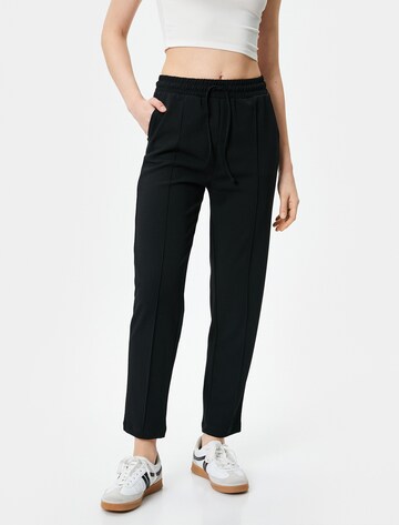 Koton Regular Trousers in Black: front