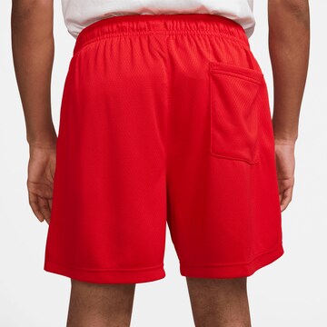Nike Sportswear Regular Workout Pants in Red