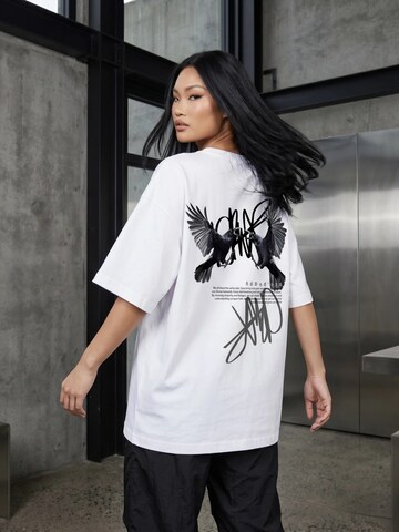 QWX2 - Camiseta talla grande 'UNITY' en blanco