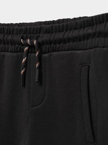 MANGO KIDS Zwężany krój Spodnie 'FRANCIA5' w kolorze czarny