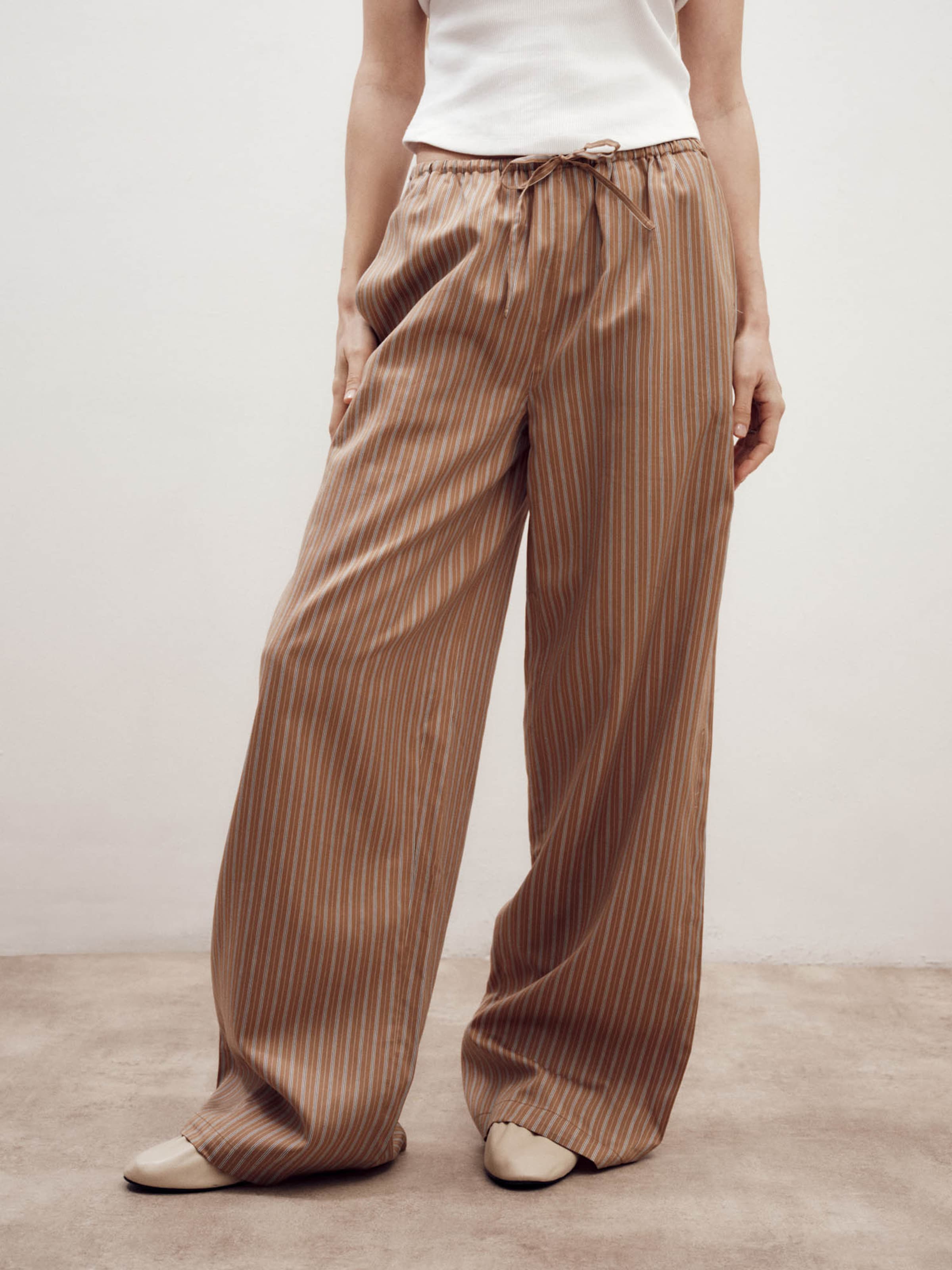 ABOUT YOU x Marie von Behrens Loose fit Pants 'Lia' in Brown