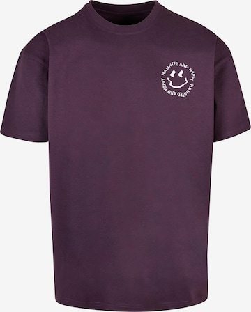 Merchcode T-Shirt 'Halloween - Haunted and Happy' in Lila: Vorderseite