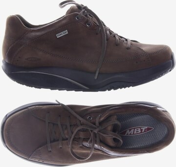 MBT Flats & Loafers in 39 in Brown: front