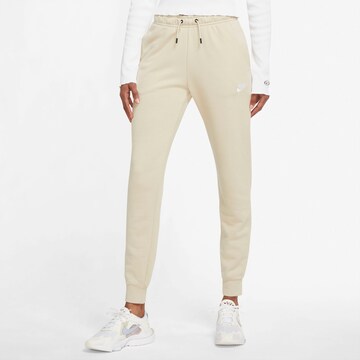 Nike Sportswear Tapered Trousers in Beige