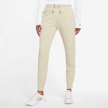 Effilé Pantalon Nike Sportswear en beige