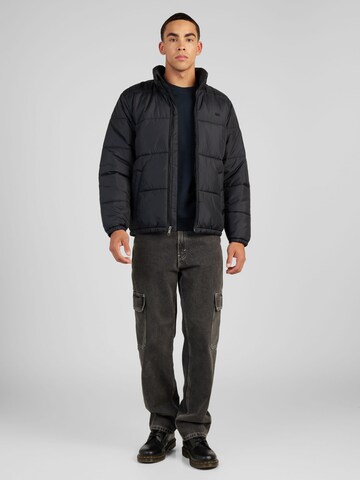 LEVI'S ® Φθινοπωρινό και ανοιξιάτικο μπουφάν 'Sunset Short Puffer' σε μαύρο