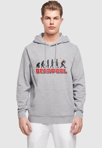 ABSOLUTE CULT Sweatshirt 'Deadpool - Evolution' in Grijs: voorkant