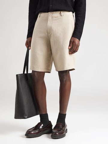 Loosefit Pantalon chino ARMANI EXCHANGE en beige : devant