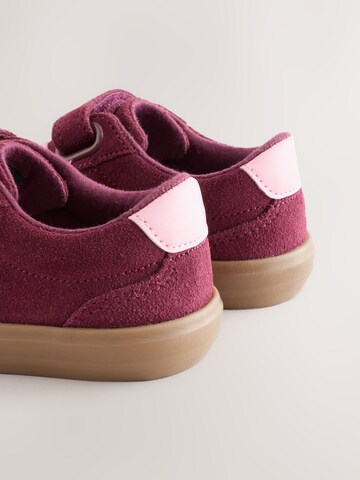 Baskets Next en rouge