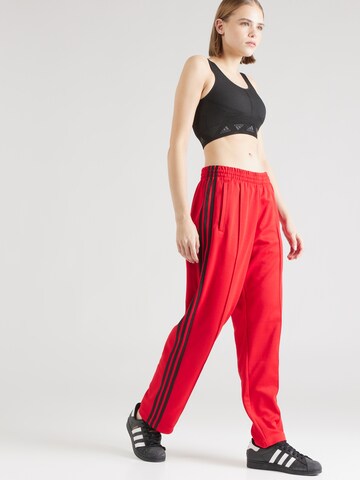 regular Pantaloni di ADIDAS ORIGINALS in rosso