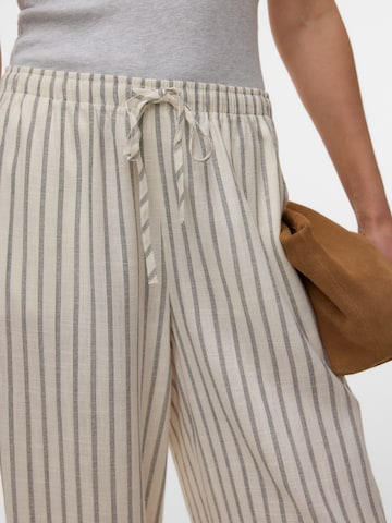 VERO MODA Zvonové kalhoty Kalhoty 'VMROSIE' – béžová